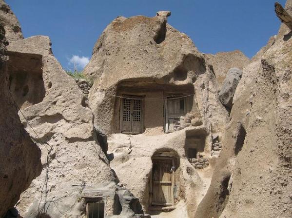 In-front-of-a-stone-house-Photo-Credit-Ali-Mirghaderi